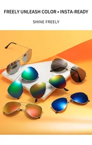 Detail view of colorful aviator sunglasses with gold metal frames and diverse lens tints