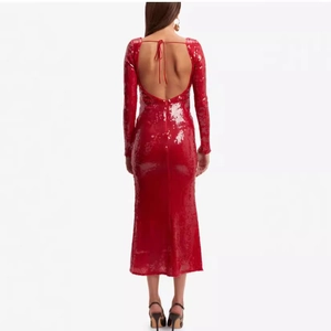 Sparkly red sequin long sleeve maxi dress featuring a sexy backless lace-up design