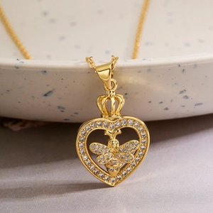 Golden heart and crown pendant necklace with bee motif and zircon stones detail