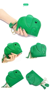 Macro detail of green leather elephant coin purse with pebble grain and gold keychain