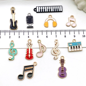 Colorful musical instrument alloy charms with ruler showing 1-3cm size measurement