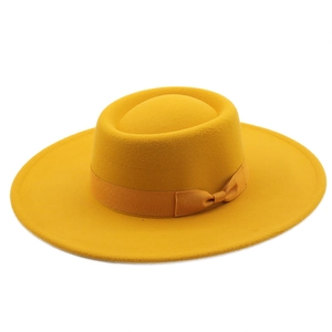 Classic yellow wool felt boater hat with flat top and wide brim for elegant styling