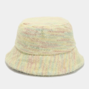 Detail showing soft knitted plush texture and colorful dyeing of the bucket hat