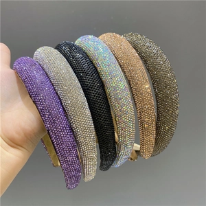 Close-up of sparkling rhinestone padded headbands in six vibrant colors for women