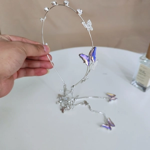 Silver rhinestone headband with purple iridescent butterflies and long tassel chain