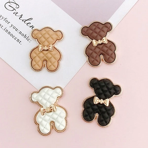 Quilted texture bear charms with gold bows in four colors for DIY garment accessories