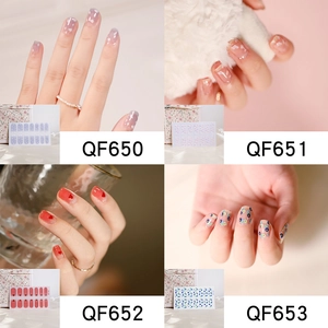 Detail view of four nail sticker designs featuring lavender clouds and heart patterns