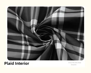 Detail of classic black white and grey plaid inner lining on casual sports jacket