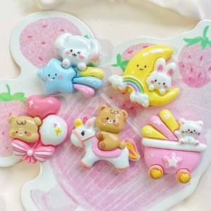 DIY resin accessories set with cute cartoon animals including pink bear and yellow moon rabbit