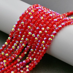 Macro shot of faceted 4mm red crystal beads with AB coating for DIY jewelry making