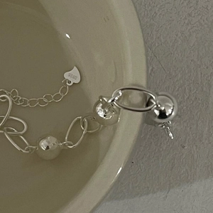 Minimalist 925 sterling silver beaded bracelet featuring polished round silver beads