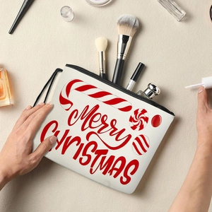 White Christmas cosmetic bag with red Merry Christmas text and festive candy illustrations