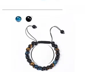 Detail of 8mm Blue Tiger Eye and Black Agate double-layer beaded bracelet with adjustable cord