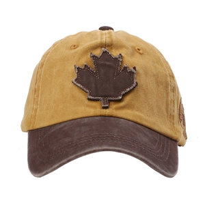 Vintage mustard and brown washed cotton baseball cap with maple leaf patch and side badge