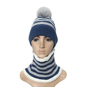 Detail of blue striped knit hat and scarf set with thick white faux fleece lining