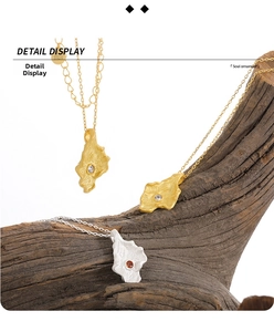 Detailed macro of S925 silver irregular textured pendants with embedded gemstones
