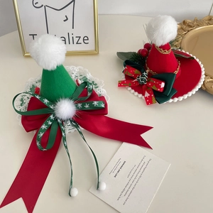 Exquisite Christmas hair clip with red and green velvet hat, white pompom and lace details