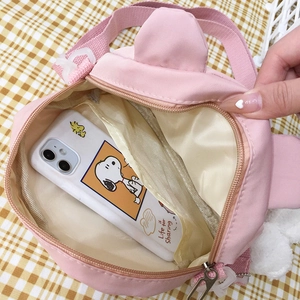 Cute pink bear canvas crossbody bag for women showing spacious interior capacity