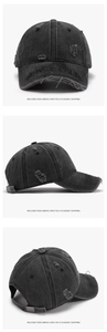 Detailed views of washed grey baseball cap with embroidery, distressing, and metal buckle