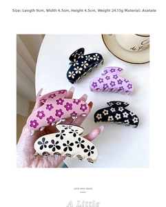 Detailed set of five floral acetate shark hair clips with size and weight dimensions
