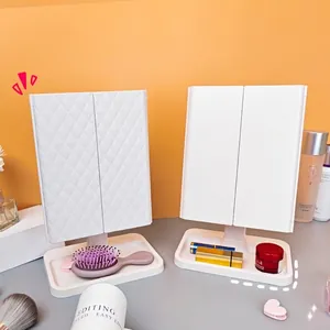 Adjustable tri-fold LED makeup mirror with storage base in white diamond pattern