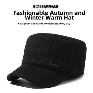 Detailed close-up of textured black winter cadet cap with metal sport logo and warm lining