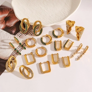 Collection of geometric gold-plated stainless steel hoop earrings with crystals