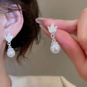 Elegant French vintage pearl drop earrings with sparkling rhinestone crown design