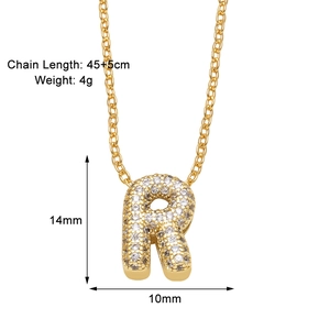 Detailed view of gold letter R pendant necklace with dimensions and zircon inlay details