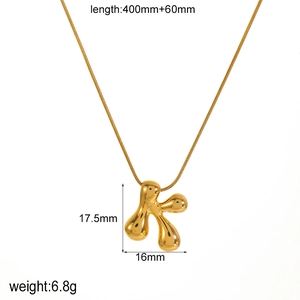 Macro detail of gold K-letter pendant showing 17.5mm size and dimensions for DIY necklace