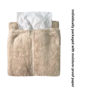 Detail view of beige plush fabric texture with zipper and moisture-proof paper inside