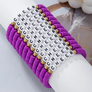 Detail of purple clay bead bracelet with CHEER letter beads on a white pedestal display