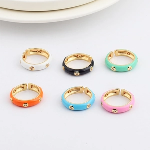 Detailed view of colorful enamel rings with AAA zircons and adjustable gold plating