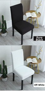 Detail of stretchable ribbed chair covers in black and cream beige for home dining