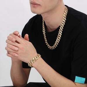Iced out gold Cuban link chain and bracelet set with sparkling diamonds for men