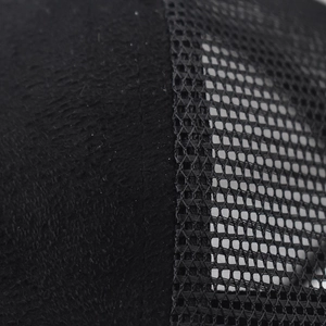 Detail of baseball cap stitching showing cotton fabric and breathable mesh texture