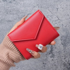 Minimalist red envelope style short wallet for women made of premium faux leather material