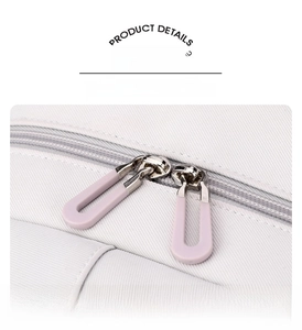 Close-up of durable purple two-way zippers on high-quality nylon school backpack