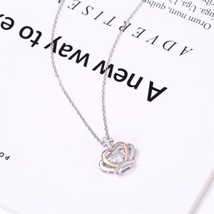 Elegant crown and heart necklace with rose gold finish and sparkling round cubic zirconia