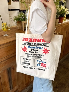 Large canvas tote bag with vintage American print for stylish daily commuting wear