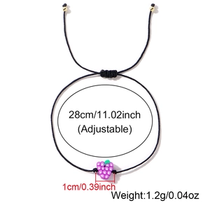 Bracciale regolabile in argilla polimerica uva viola con corda nera da donna