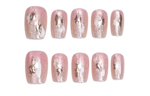 Détail de lot de 10 faux ongles rose œil de chat avec feuille d'or et paillettes