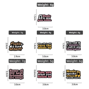 Detailed size and weight chart for music-themed enamel pins with motivational quotes