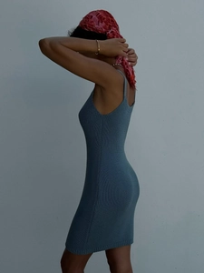 Elegant slim-fit ribbed knit mini dress in dusty blue with spaghetti straps and bodycon silhouette