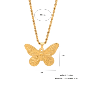 Detailed view of golden butterfly necklace with 40+5cm chain and 2x3cm pendant dimensions