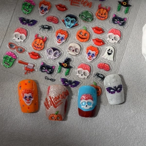 3D embossed Halloween nail stickers featuring pumpkins, skulls and ghosts on a sheet