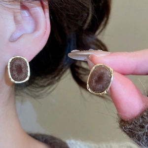 Retro oval flocked earrings in dark brown velvet with elegant gold metallic borders