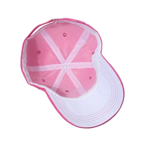 Pink cotton baseball cap interior view showing adjustable strap and inner white lining