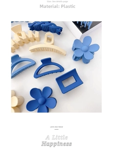 Matte flower and geometric hair claw clips set in navy blue and cream white colors