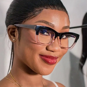 Detail shot of vintage square glasses frames with black to clear gradient finish and clear lenses